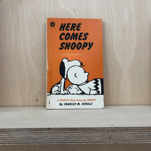 Peanuts “Here comes Snoopy” book.