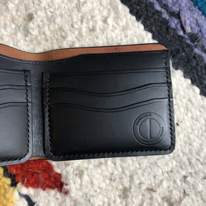 Black vegetable dyed bi fold wallet